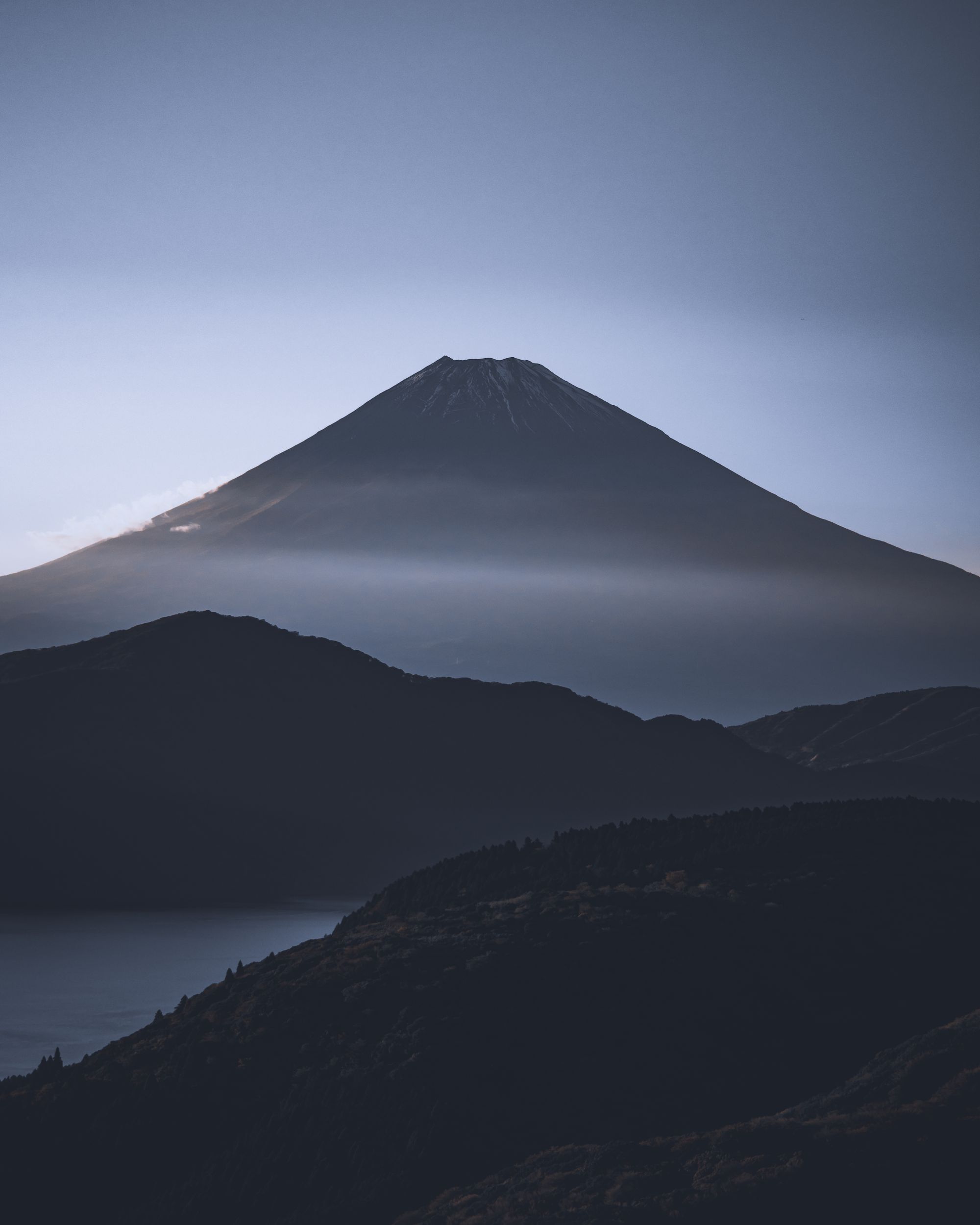 Mount Fuji seen through dawn haze